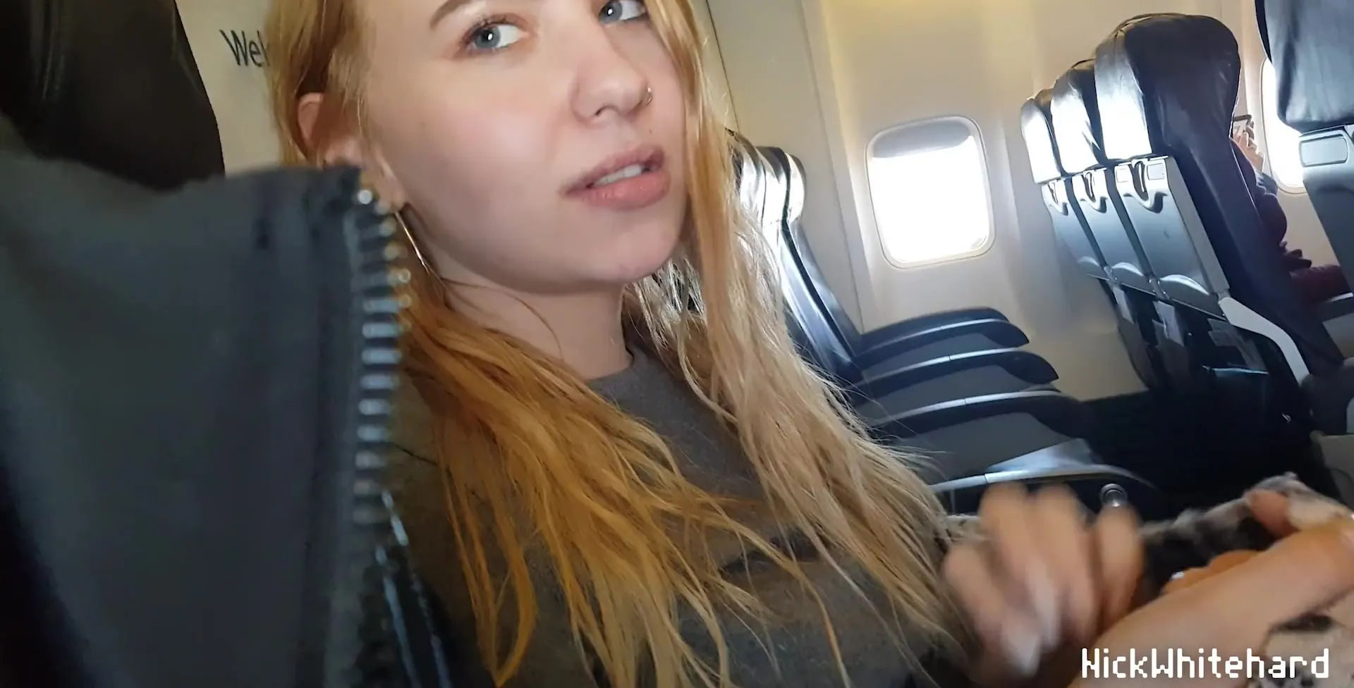 Amateur girl jerks him in public, on the plane POV 