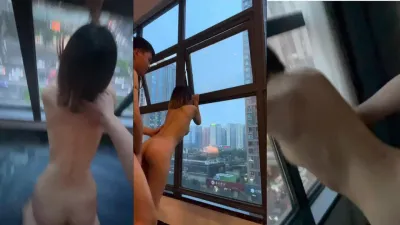 A very open young couple, having sex in front of the floor-to-ceiling windows, so exciting 